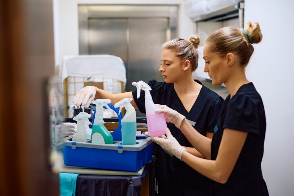 maid restocking cleaning supplies