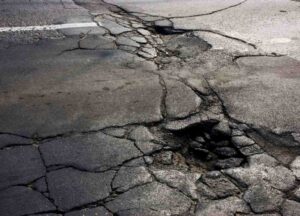 badly cracked asphalt 