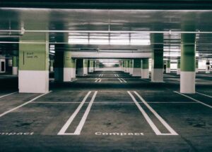 A underground parking lot marked in white