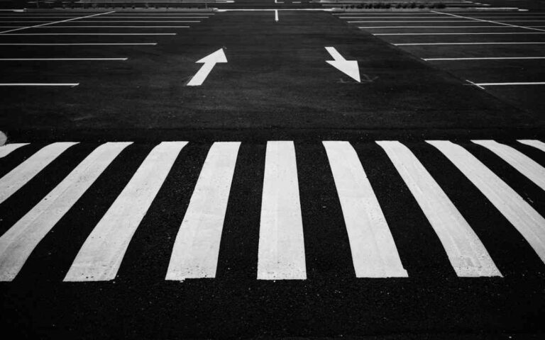 fresh asphalt with pedestrian crossing labeled