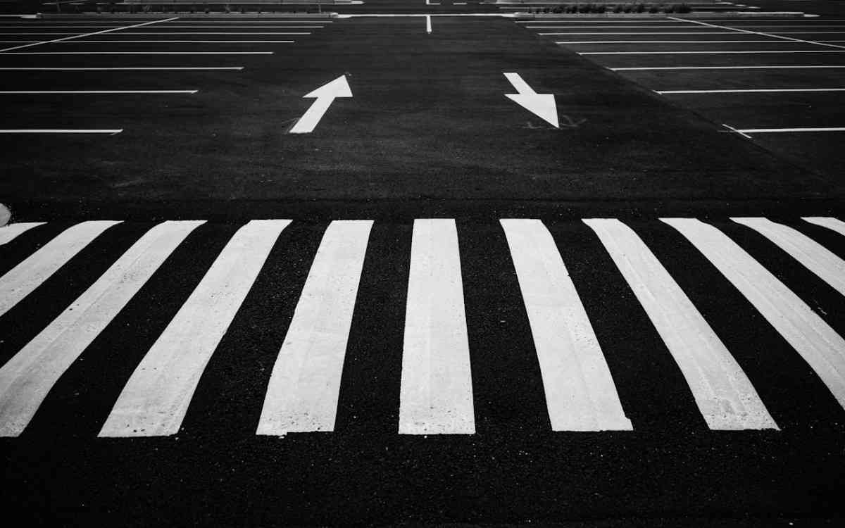 fresh asphalt with pedestrian crossing labeled