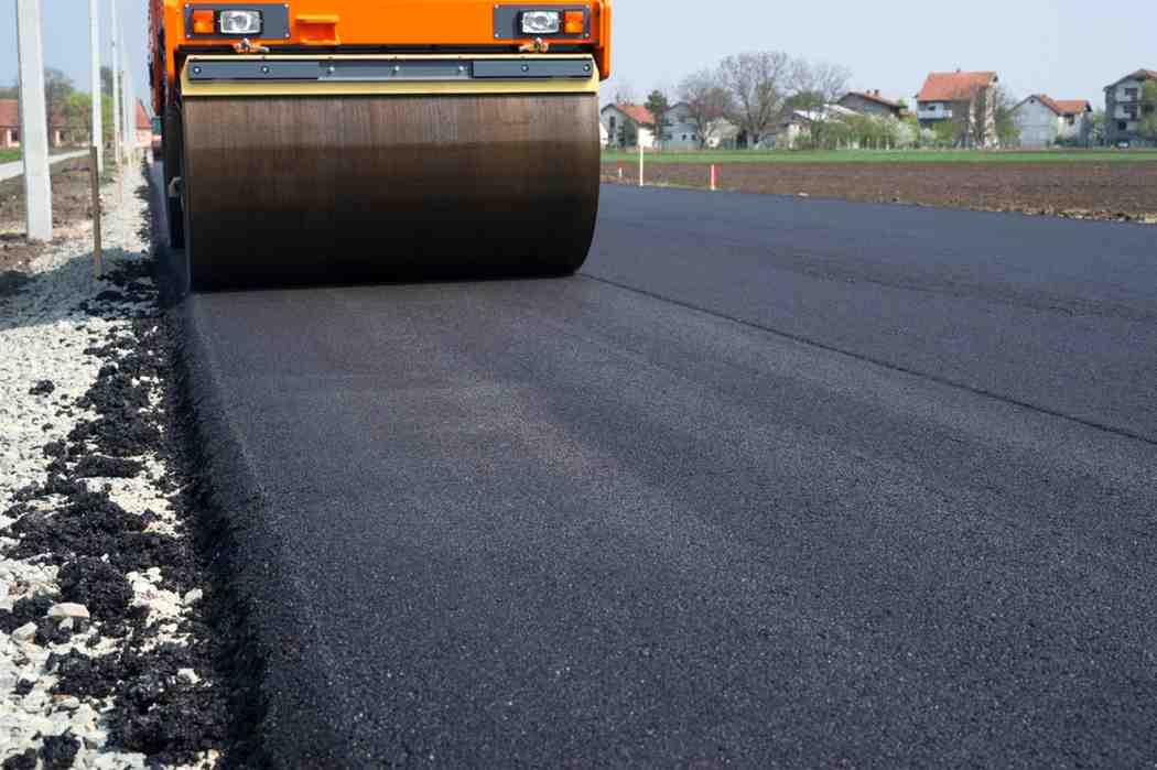 A asphalt roller compressing asphalt