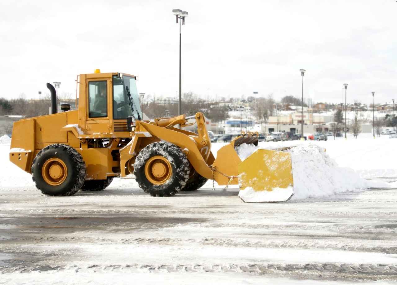 Yellow snow removal truck
