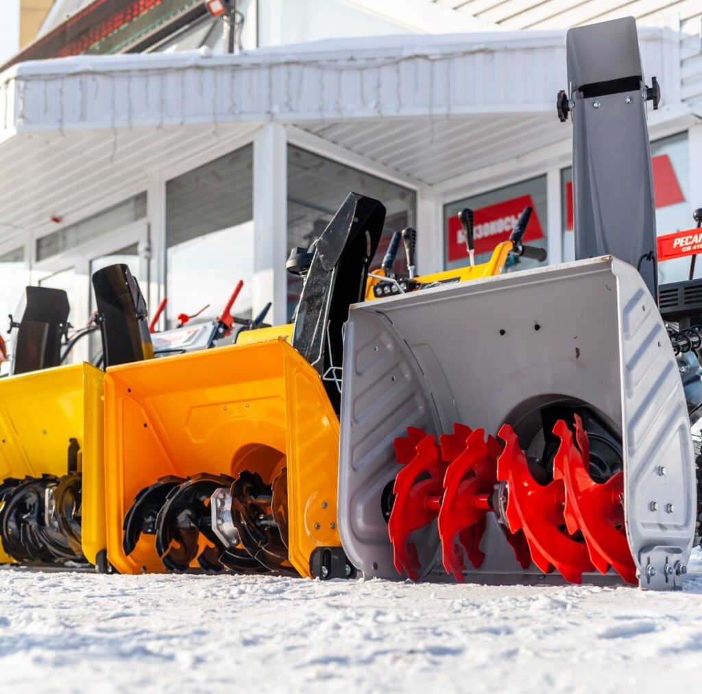 snow removal machinery in line up