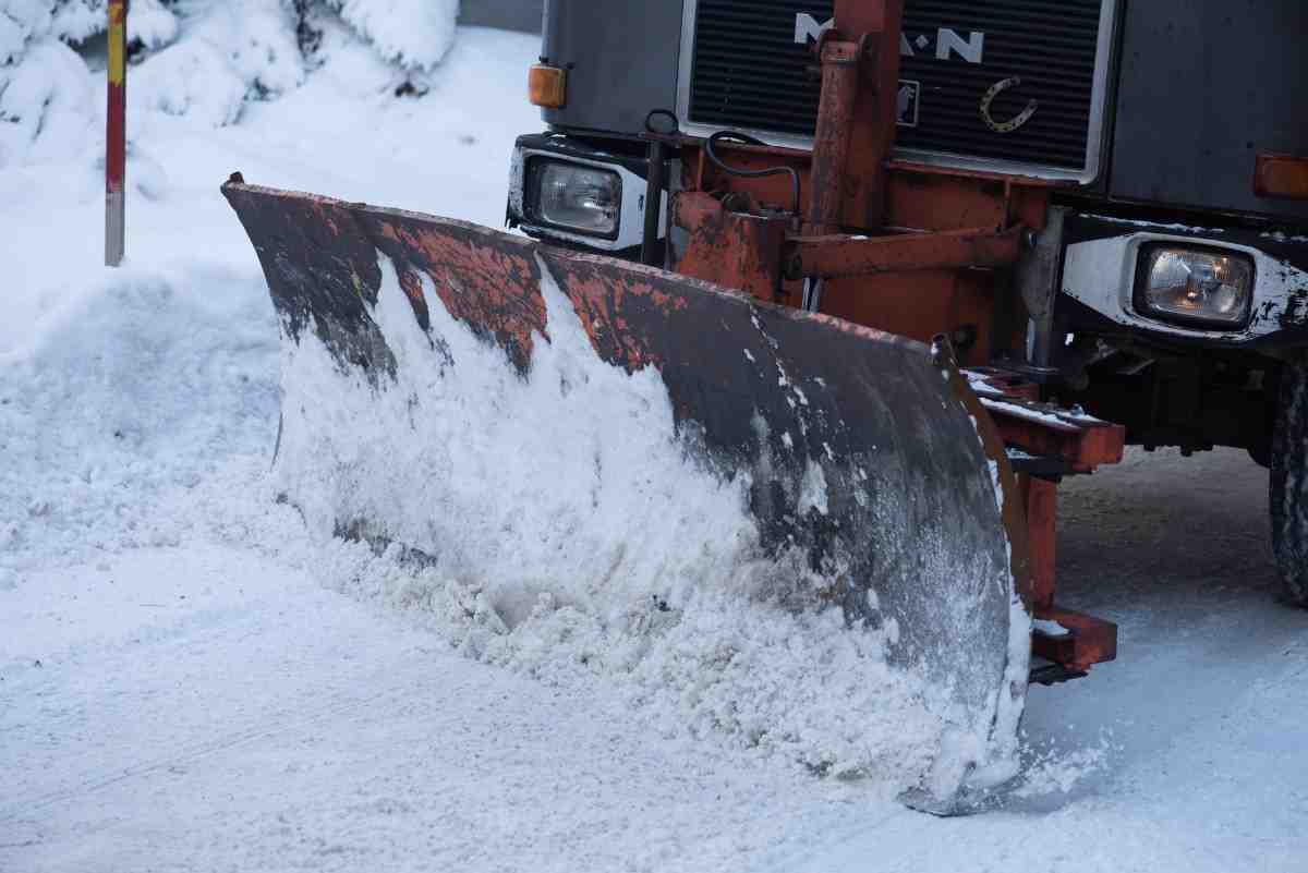 snow clearing vehicles clearing the road.