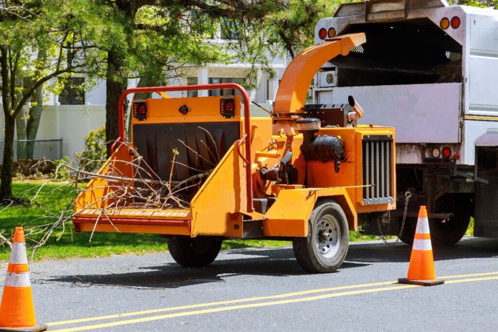
wood-chipper-blowing-tree-branches
