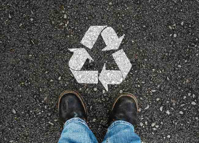 recycled asphalt icon on asphalt floor