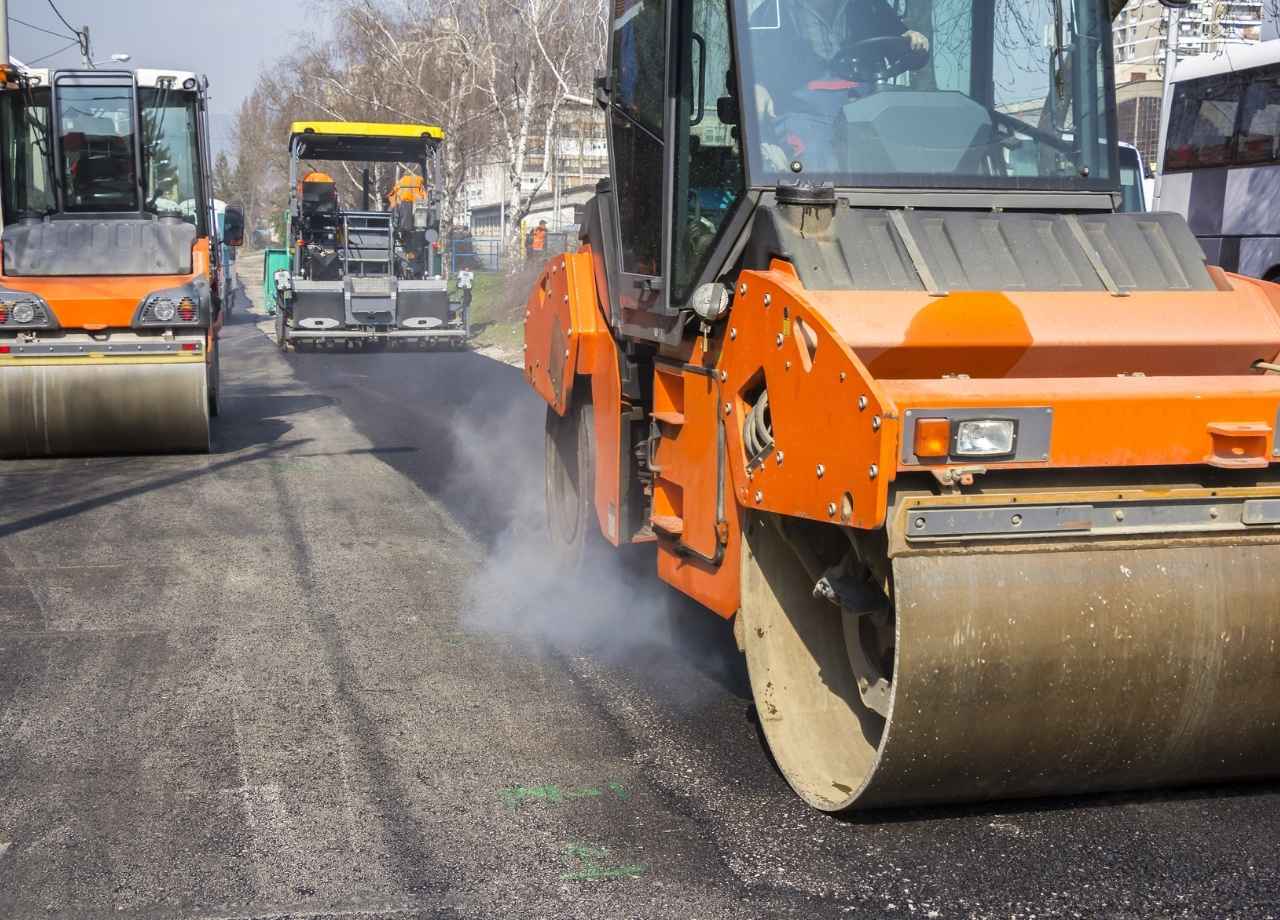rollers compacting asphalt