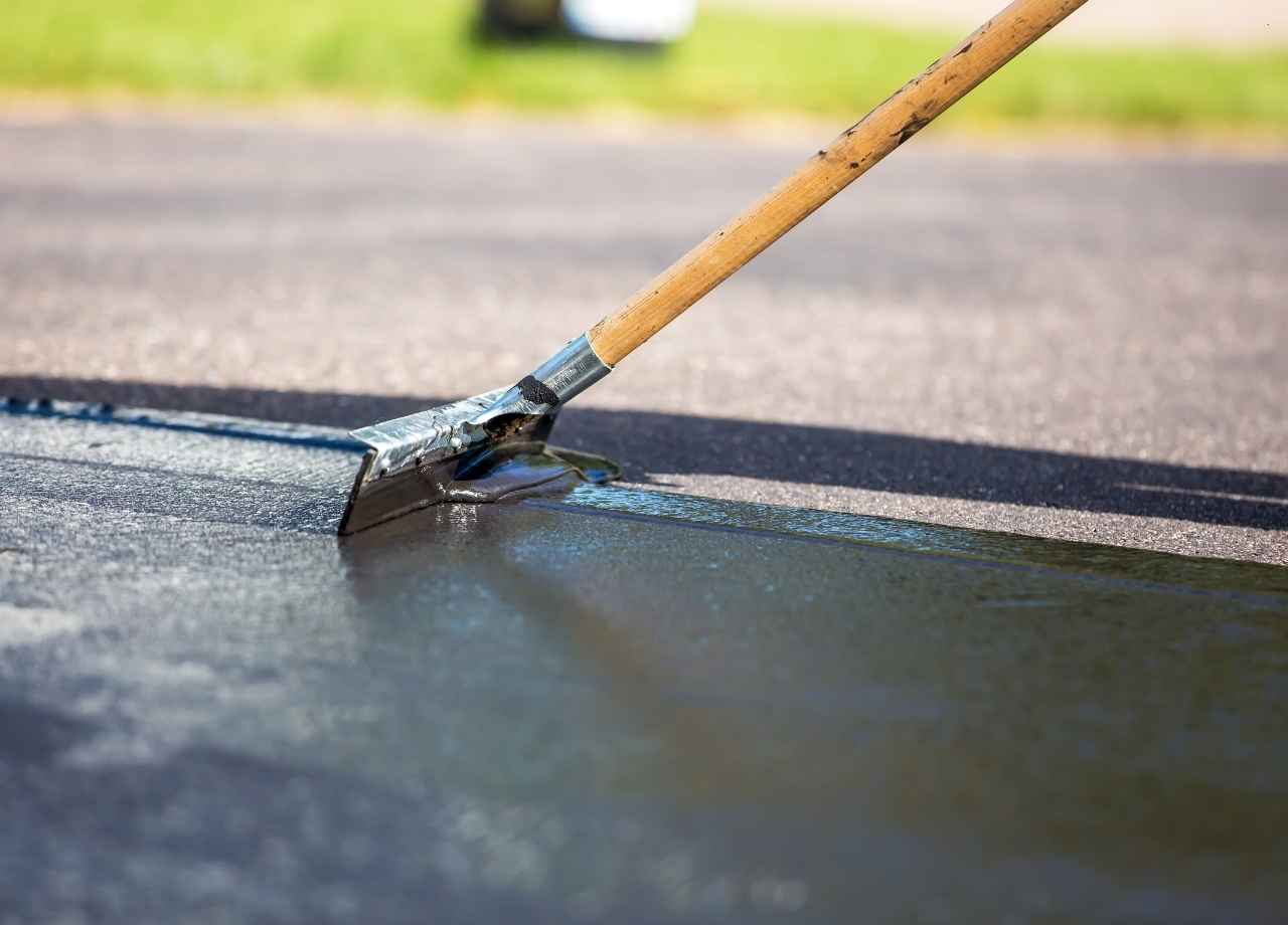 Seal Coating being appliedon asphalt 