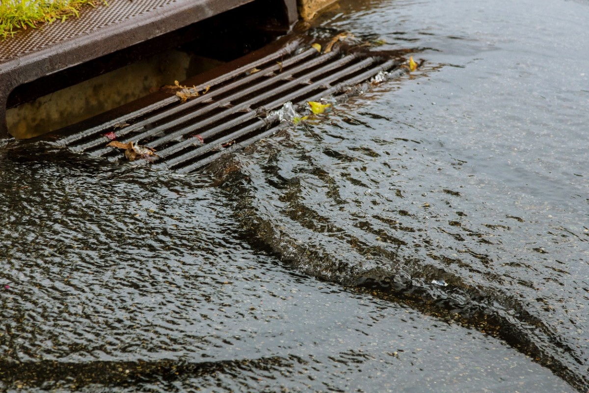 Water gushing flowing into storm sewer